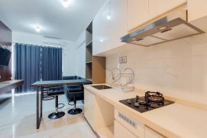 Styisth 2BR at Sky House BSD Apartment By Travelio