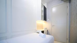 Enchanting and Stunning 2BR La Riz Supermall Mansion Apartment By Travelio