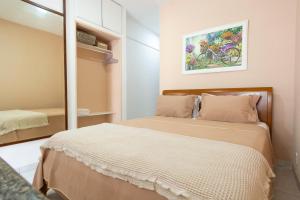 Pé na Areia - Flat na Barra com Piscina, Ar e Garagem