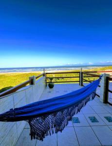 Pé na areia - AP beira-mar