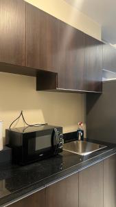 Aurora Escalades Tower near Smart Araneta Colisium