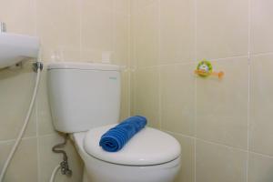 Fancy and Simply 1BR Apartment at M-Town Residence By Travelio