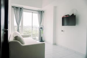 Wonderful 1BR Casa De Parco Apartment near ICE BSD By Travelio