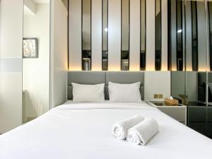 Best Deal and Cozy Studio Room Transpark Cibubur Apartment By Travelio