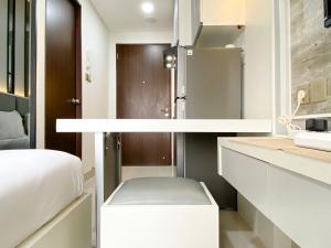 Best Deal and Cozy Studio Room Transpark Cibubur Apartment By Travelio
