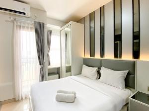 Best Deal and Cozy Studio Room Transpark Cibubur Apartment By Travelio