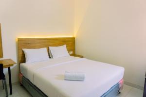 Cozy and Simply Look Studio No Kitchen Apartment Aeropolis Residence By Travelio