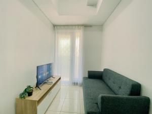 Best Homey and Nice 1BR at Boutique Kemayoran Apartment By Travelio
