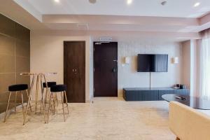 Scenic and Comfortable 2BR Branz BSD City Apartment By Travelio