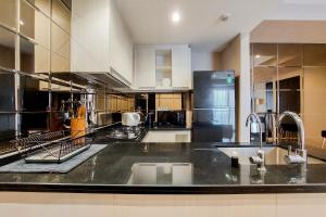 Scenic and Comfortable 2BR Branz BSD City Apartment By Travelio