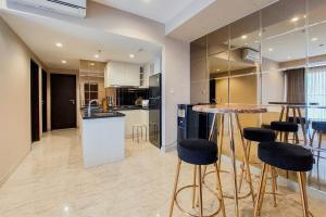 Scenic and Comfortable 2BR Branz BSD City Apartment By Travelio