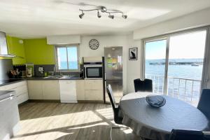 Appartements Pieds Dans L'eau T3 Top Cosy - Face a la mer : photos des chambres