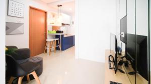 Minimalist and Beautiful 1BR with Extra Room at Pavilion Permata Apartment By Travelio