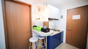 Minimalist and Beautiful 1BR with Extra Room at Pavilion Permata Apartment By Travelio