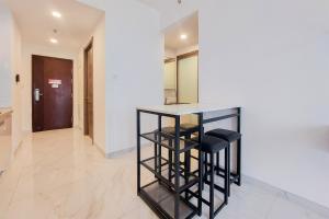Comfortable and Homey Living 2BR at Sky House BSD Apartment By Travelio