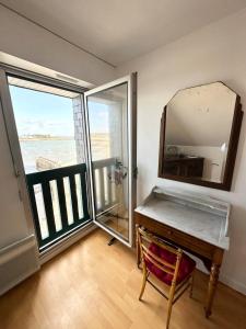 Appartements T3 Duplex Vue mer 180 sur le port de Lomener : photos des chambres