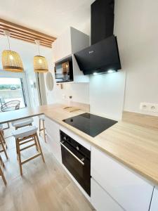 Appartements T3 Neuf Archi Cocooning - Terrasse - Face a la mer : photos des chambres