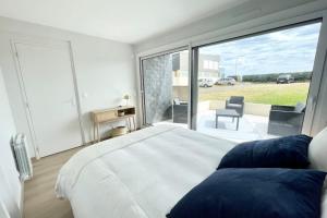 Appartements T3 Neuf Archi Cocooning - Terrasse - Face a la mer : photos des chambres