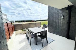 Appartements T3 Neuf Archi Cocooning - Terrasse - Face a la mer : photos des chambres