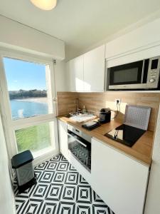 Appartements Pieds Dans L'Eau T2 Archi Cosy - Vue mer 180 : photos des chambres