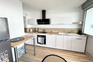 Appartements Lovely T1 d architecte de standing Vue mer 360 : photos des chambres