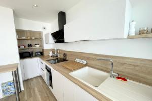 Appartements Lovely T1 d architecte de standing Vue mer 360 : photos des chambres