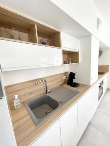 Appartements Spacieux appartement neuf de standing Hyper Cosy : photos des chambres