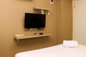 Comfy and Best Location Studio Room at Bassura City Apartment By Travelio