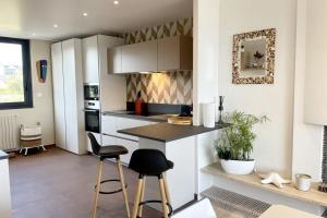 Appartements Luxury T3 neuf de standing Front de mer vue 180 : photos des chambres
