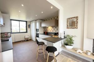 Appartements Luxury T3 neuf de standing Front de mer vue 180 : photos des chambres