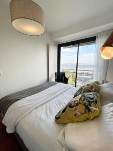 Appartements Luxury T3 neuf de standing Front de mer vue 180 : photos des chambres