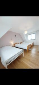 Maisons de vacances Maison de charme vue mer 180 renovee Acces plage : photos des chambres