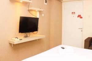 Great Location and Simply Studio Room at Bassura City Apartment By Travelio