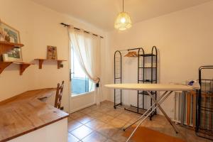 Maisons de vacances Le Melomane - Maison climatisee avec jardin clos : Maison 3 Chambres