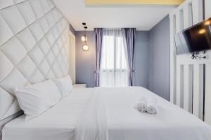 Comfortable and Minimalist 1BR at The Ayoma Apartment By Travelio