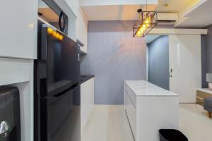 Comfortable and Minimalist 1BR at The Ayoma Apartment By Travelio