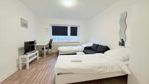 Zentrale Apartments in Neumünster direkt an der Stadthalle mit Küche & WLAN