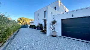 Villas Maison La pause Contemporaine et Piscine Privee : photos des chambres