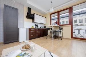 Modern Apartments in the Center of Warsaw by Noclegi Renters