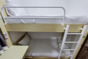 Comfortable Design 2BR with Washing Machine Sky House BSD Apartment By Travelio