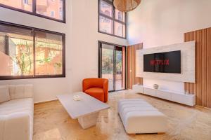 Duplex Le Majorelle, Res devant le jardin, piscine