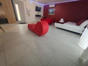 Maisons de vacances Un amour passionnel,love room,15 min du zoo,piscine couverte et chauffee d-avril a octobre a partager avec d-autres logements et elle est privatisee de 20h a 22h : photos des chambres