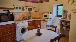 Maisons de vacances L'Oustalou - WIFI - Jardin - Campagne : photos des chambres