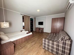 Double Room with Balcony (2 Adults + 1 Child) room in Recreation complex Volnogora