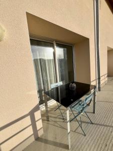 Appartements Charmant logement avec parking a 25 min de Lyon : photos des chambres