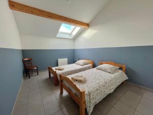 Appartements Charmant logement avec parking a 25 min de Lyon : photos des chambres