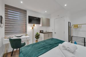 Micro Chic, Tiny Studio with Functional Desk