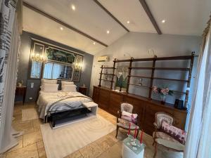 Appartements Gite non attenant a la propriete 1 a 4 personnes, spa, sauna, piscine chauffee a partager, parking gratuit : photos des chambres