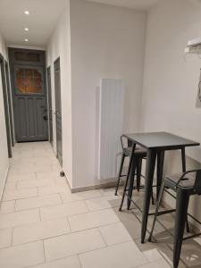 Villas Maison en centre ville : photos des chambres