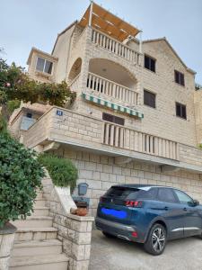 Apartments Pavao - 3hvězdičkové hotely ve městě Postira